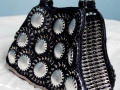 Soda can bottom and pop tabs purse
