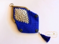 Triangular clasp pop tab purse